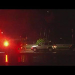 First responders working to secure sailboat in St. Augustine during Tropical Storm Ian