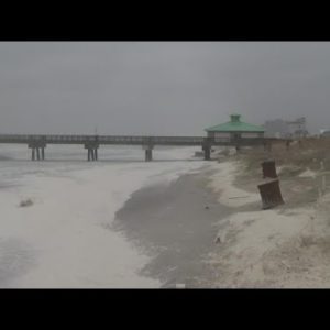 Water moves up onto the dunes on Jacksonville Beach | September 29 2pm