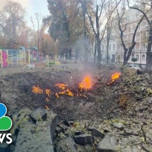 Burning Vehicles, Huge Crater After Explosions Rock Kyiv