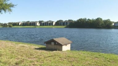 Police: Neighbors try to save man drowning in retention pond in Jacksonville, later found dead