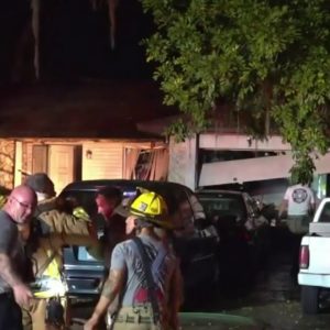 Orange County firefighters battle house fire