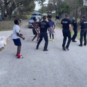 Florida troopers take break from Hurricane Relief to play basketball with local kids