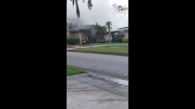 Cellphone video shows flames shooting from Orlando home