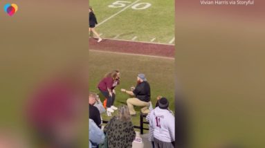 High school football team goes wild after coach proposes to girlfriend