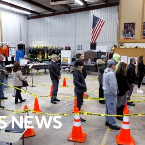 Millions of Americans head to polls amid concerns over election security