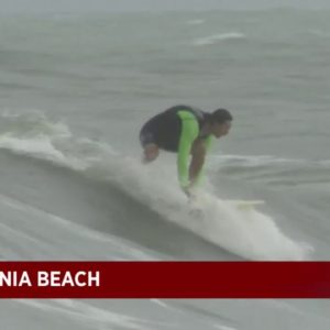 Surfers head to beach as Tropical Storm Nicole nears