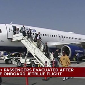 Hundreds evacuated after passenger's laptop causes small fire on JetBlue flight