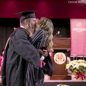 College graduate proposes to girlfriend during graduation ceremony