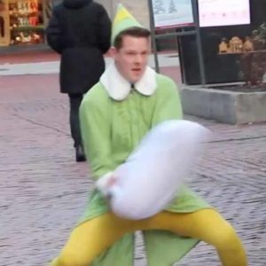 This dad goes viral each holiday season for dressing as a pillow-fighting elf