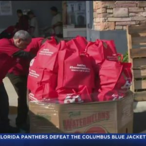 Drivers line up for annual CAMACOL Food Basket giveaway