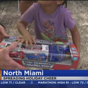North Miami police SWAT handed out toys to children