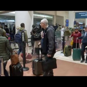 Travelers navigate delays, cancellations after winter storm wallops US