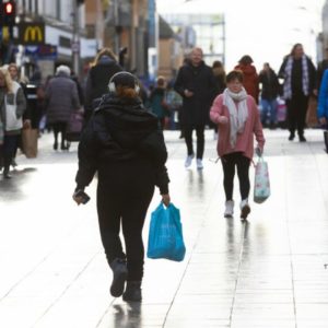 U.K. economy shrinks as inflation rises and workers go on strike