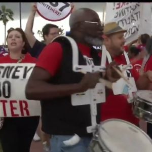 Walt Disney World cast members rally for pay raise