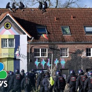 Police begin to clear climate change activists from German village earmarked for demolition