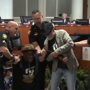 Community activist expected at city council Tuesday despite risk of being arrested — again