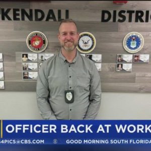 Miami-Dade police officer injured in violent crash returns to work