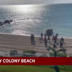 Migrants come ashore Tuesday morning in Key Colony Beach