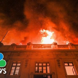 Historic building burns in Lima after anti-government protests rock city