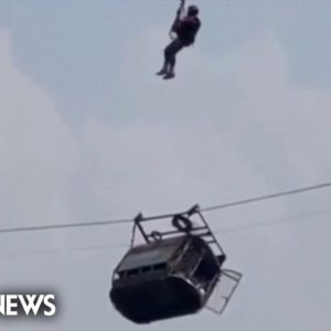 7 students and a teacher rescued from dangling cable car